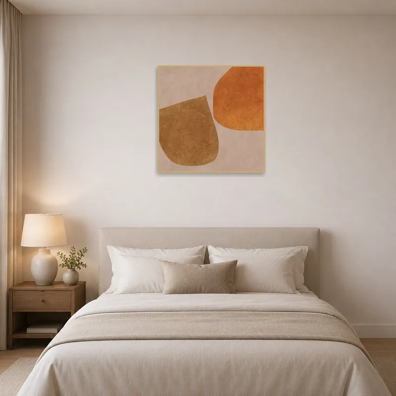 Earthy abstract piece creates a calming atmosphere in a bedroom setting.