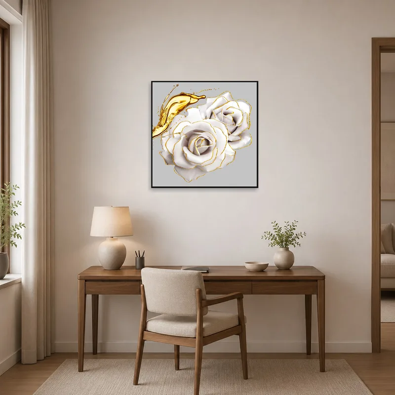White roses with gold accents in a sleek home office.