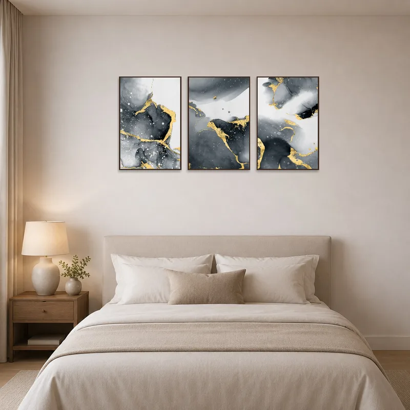Elegant triptych hanging above the headboard in a serene bedroom setting.