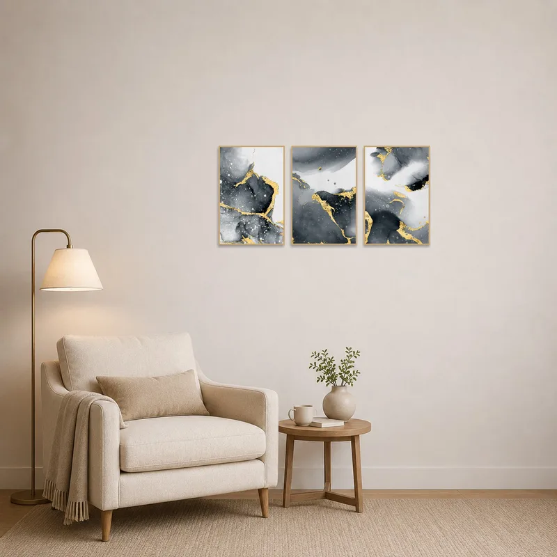 Black and gold abstract set creating a focal point in a cozy reading corner.