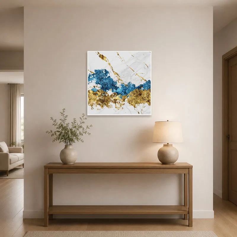 Vibrant blue and gold marble design greets guests in an entrance hall.