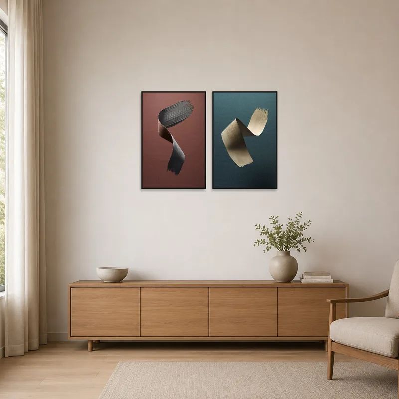 Simple brushstroke prints complement a minimalist room's clean lines.