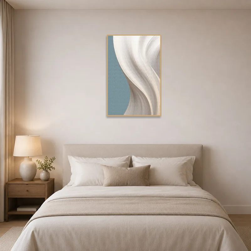 Elegant abstract piece adding warmth to a serene bedroom setting.