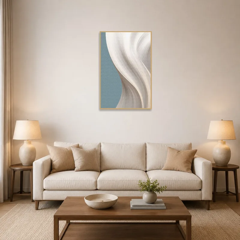 Elegant abstract artwork in neutral hues above a modern living room sofa.