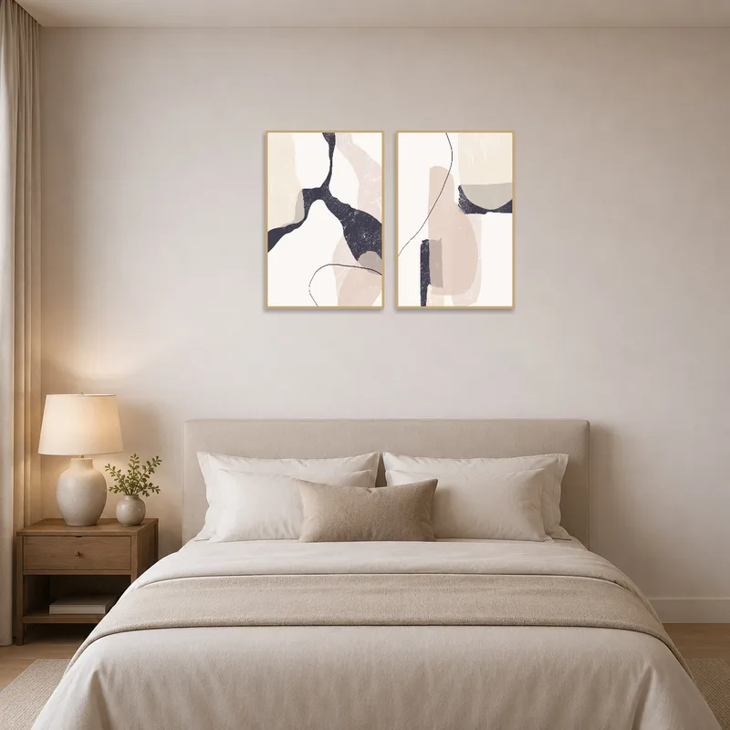Neutral-toned abstract set creates a calming atmosphere in the bedroom.