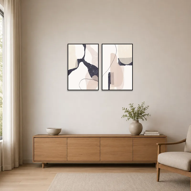 Neutral abstract art enhances the simplicity of the minimalist space.