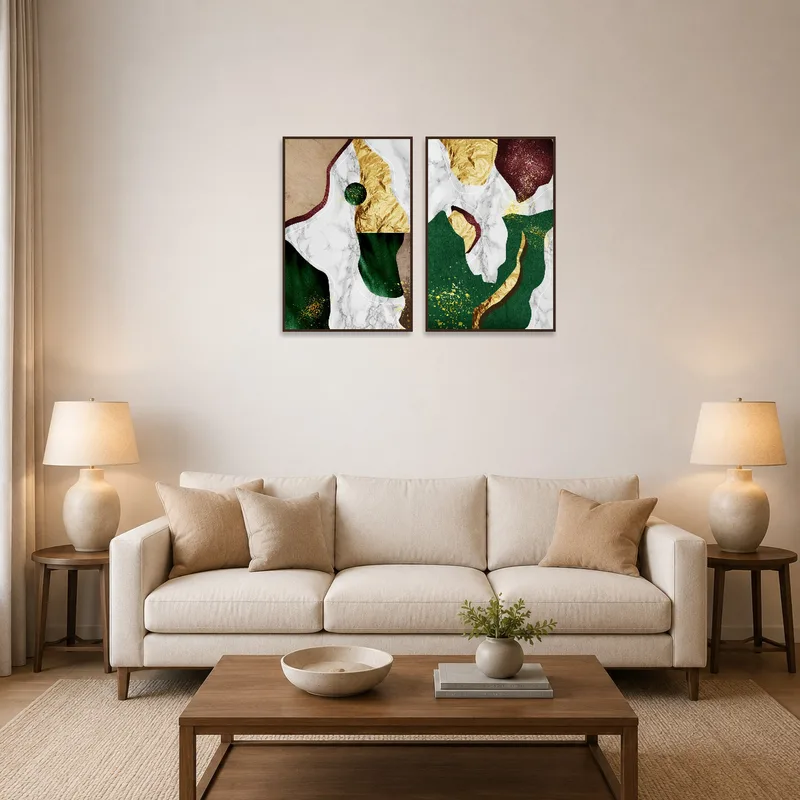 Abstract duo with gold and marble patterns hanging above a modern living room sofa.