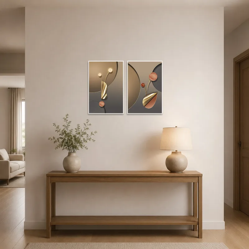 Entrance hall showcasing a set of geometric artworks with shiny metallic touches.