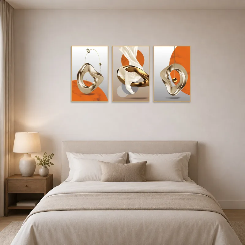 Elegant geometric triptych pieces add sophistication to a bedroom wall.
