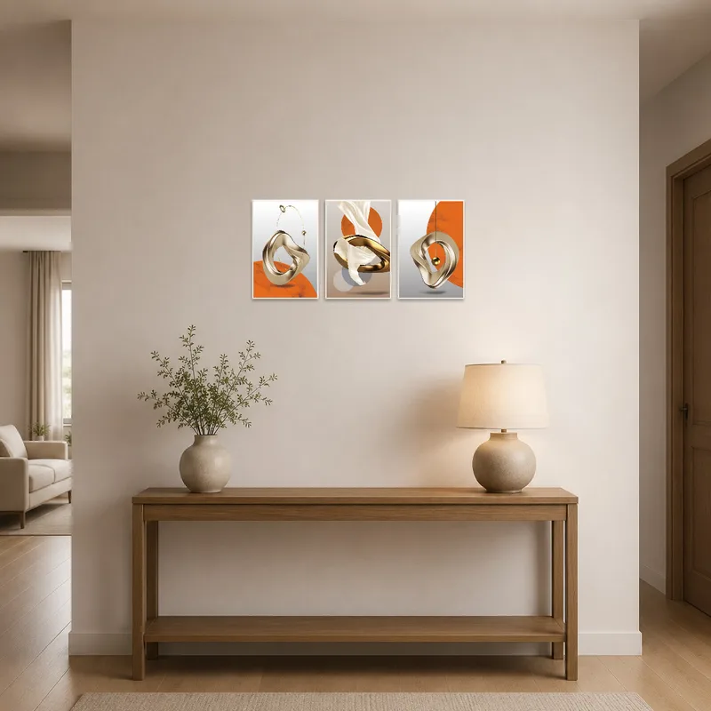 Stylish geometric art triptych set welcoming guests in an entrance hall.