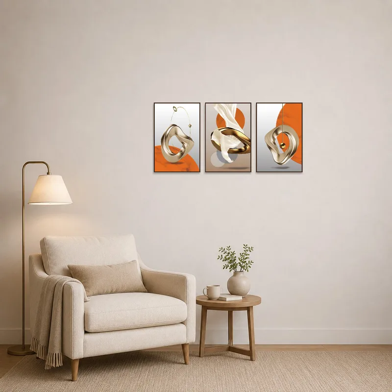 Elegant abstract triptych adds interest to a cozy reading corner.