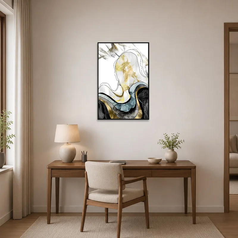 Sophisticated gold and black art inspiring creativity in a contemporary home office.