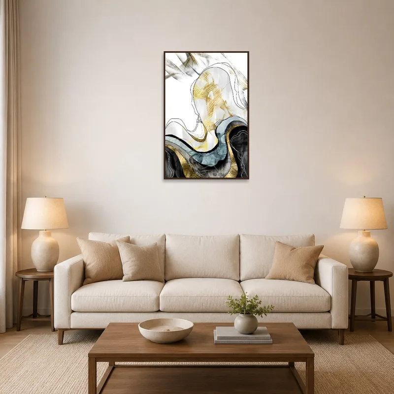 Abstract gold and black artwork above a modern living room sofa with neutral tones.