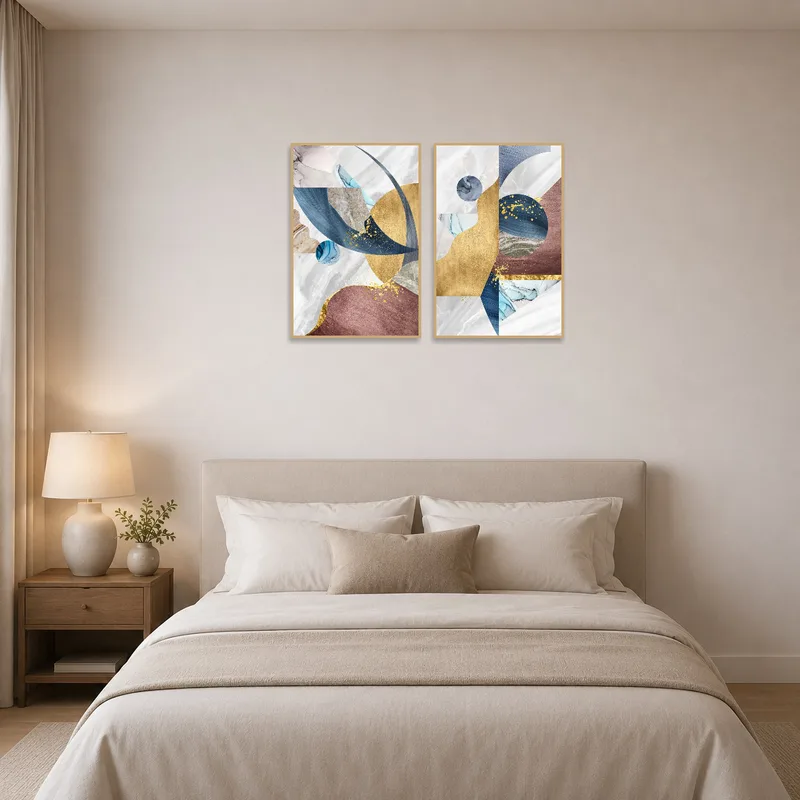 Elegant abstract pieces above a bed, adding a serene vibe.