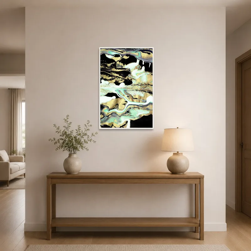In the entrance hall, abstract canvas art welcomes guests with rich gold and teal colors.