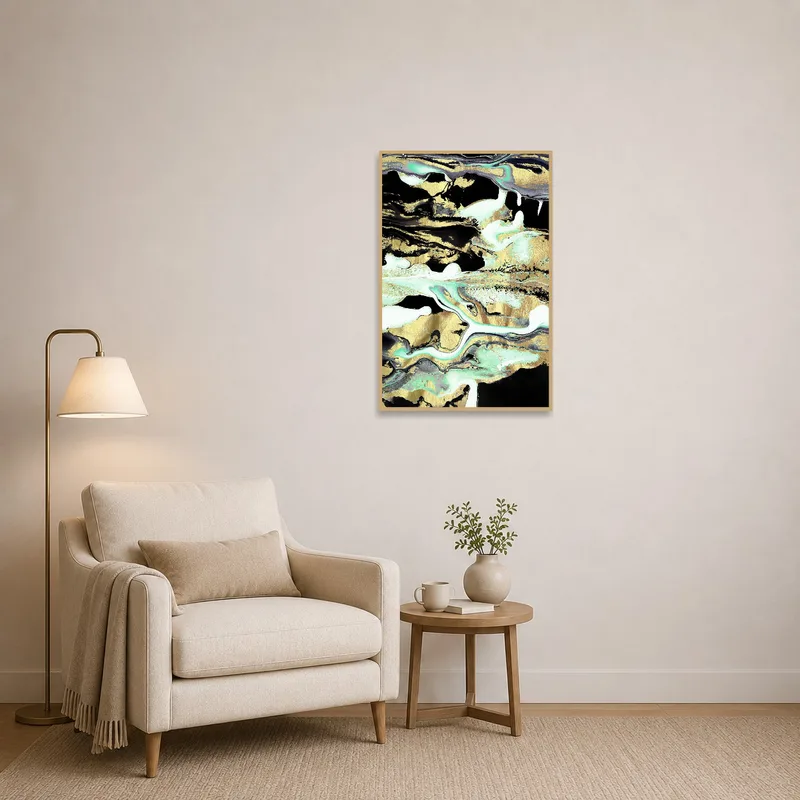 Gold and teal abstract art creates a serene atmosphere in the cozy reading corner.