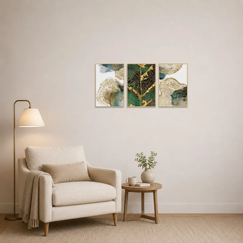 A serene reading corner featuring a gold and teal abstract triptych, complementing the cozy ambiance.