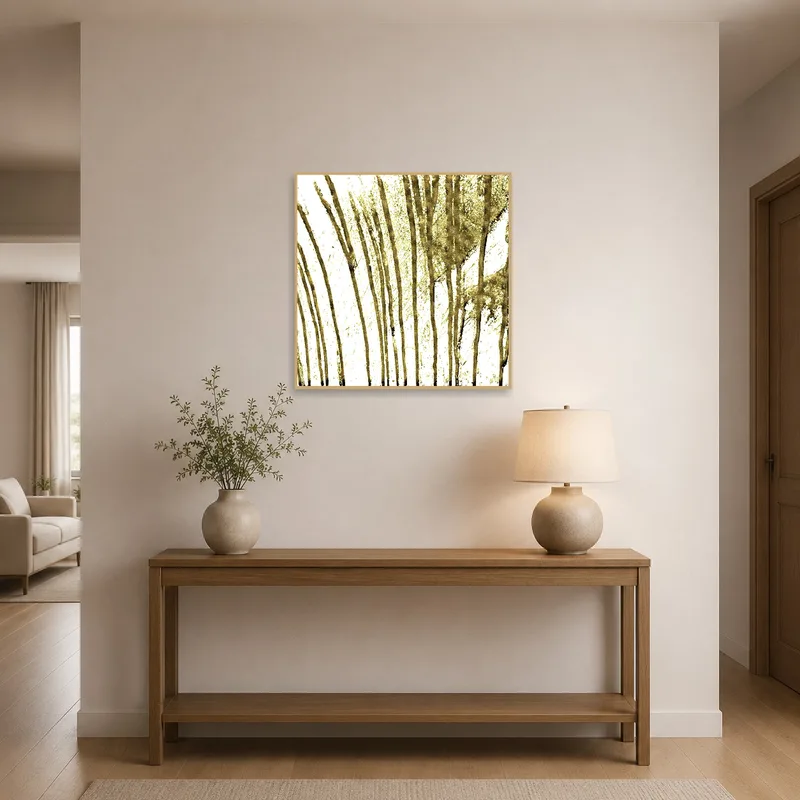 Entrance hall displaying an elegant abstract gold brushstroke art print near a wooden console table.