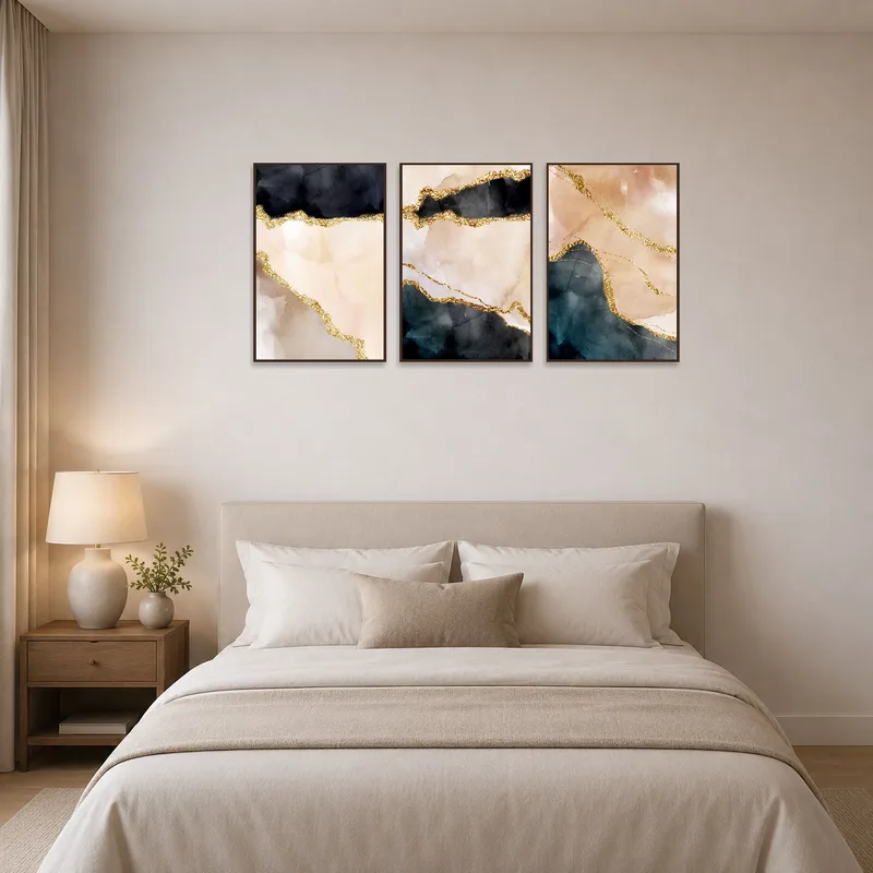 Gold and earth tone triptych brings tranquil elegance to a restful bedroom atmosphere.