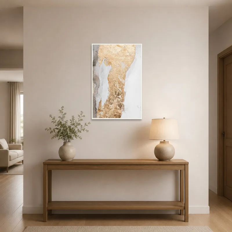Striking abstract gold texture art welcoming guests in a chic, modern entrance hall.