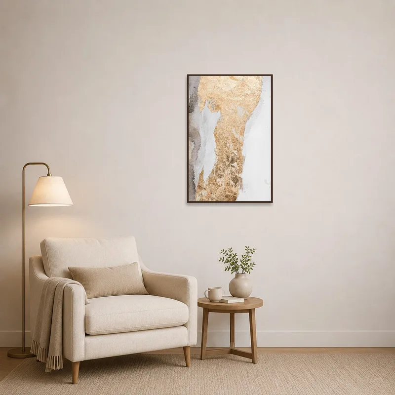 Elegant abstract piece with gold textures creating a focal point in a cozy reading corner.
