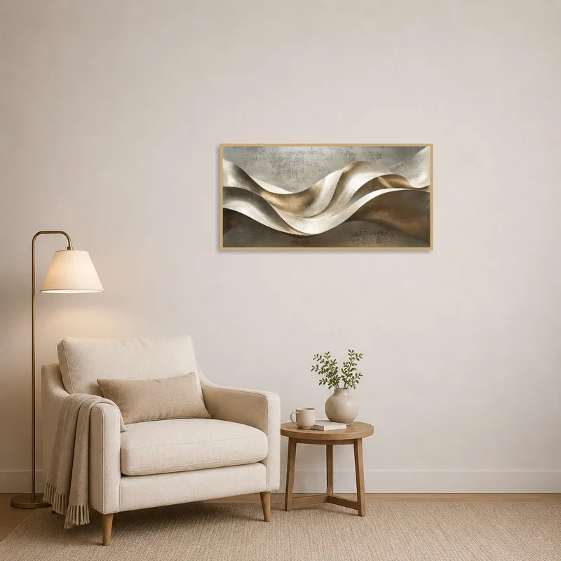 Reading corner accented by a calming abstract metallic wave wall art.