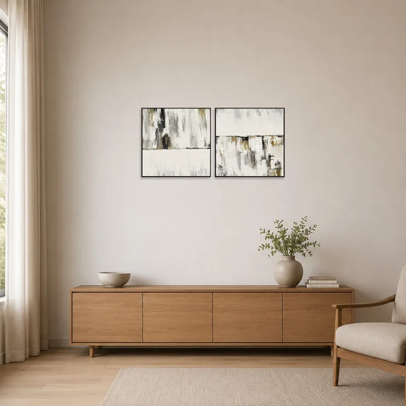 Neutral brushstroke diptych complements minimalist decor.