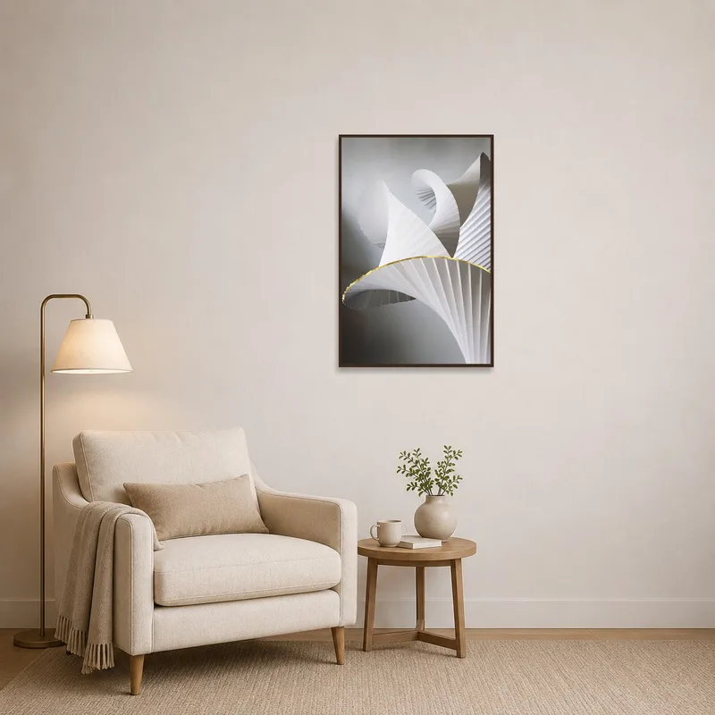 Abstract paper sculpture art print creating a cozy atmosphere in a reading corner.