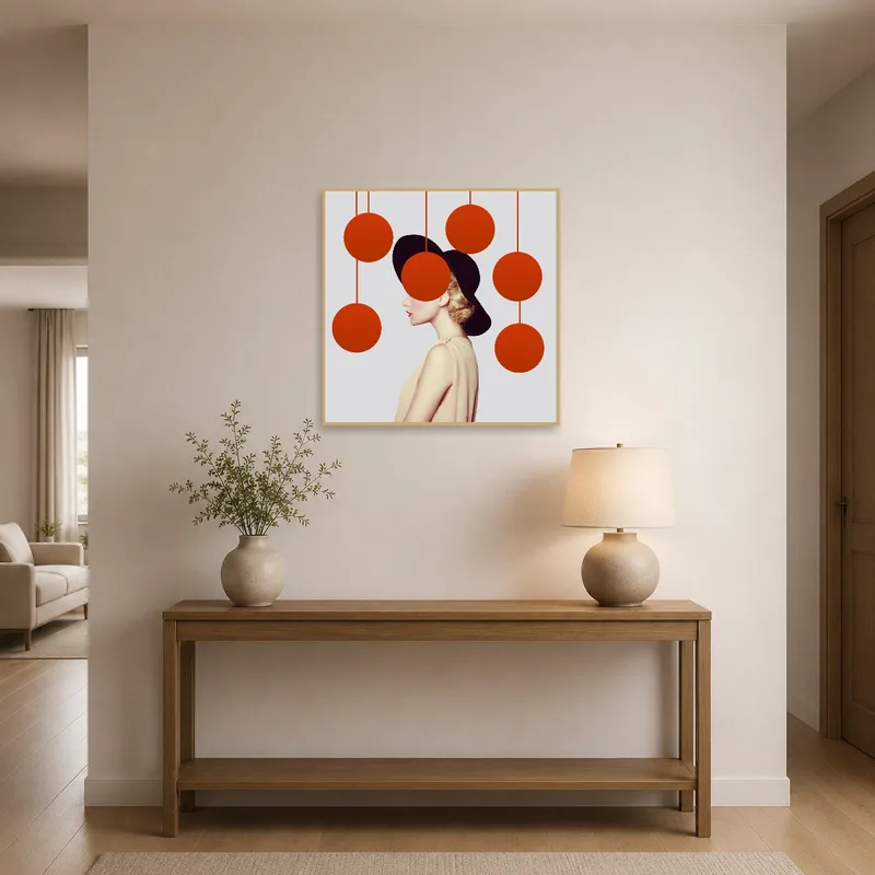 Red spheres portrait welcomes guests in an entrance hall.