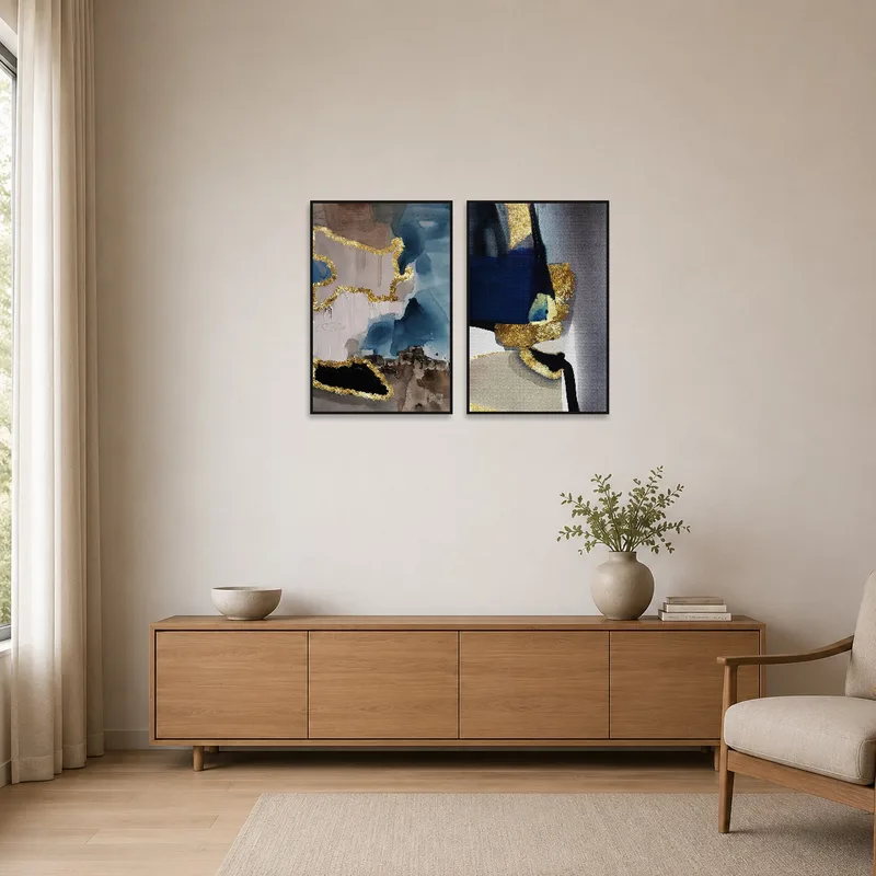 Gold-accented abstract pieces complement minimalist decor.