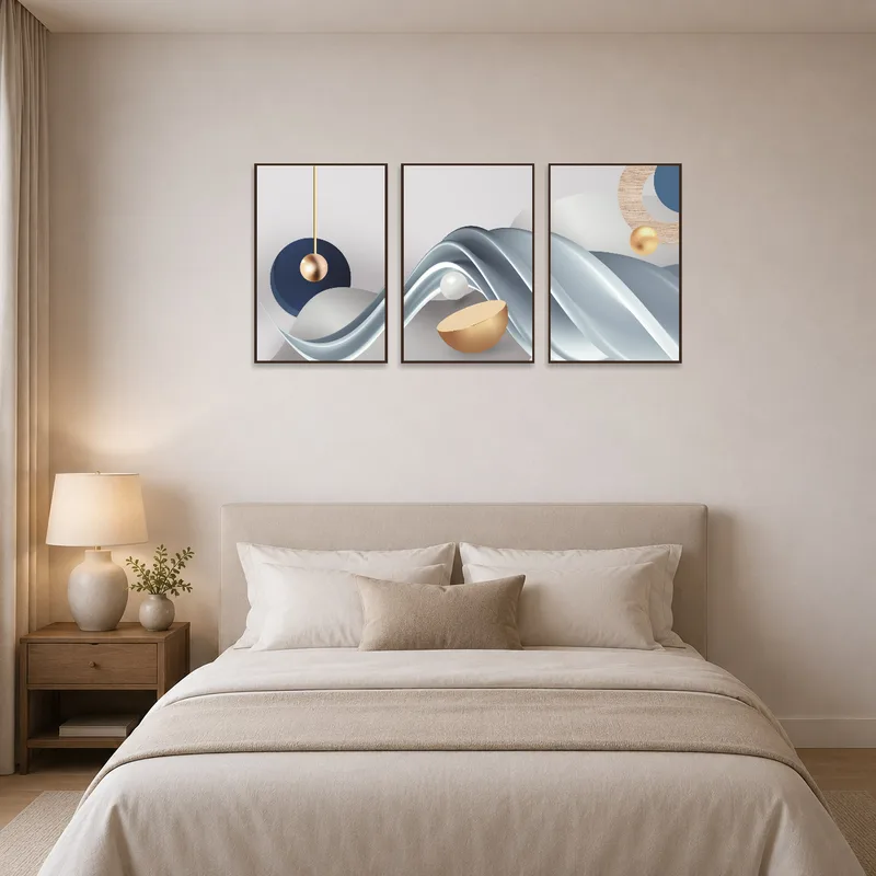 Bedroom showcasing a blue and gold abstract triptych, providing a calming and elegant vibe.
