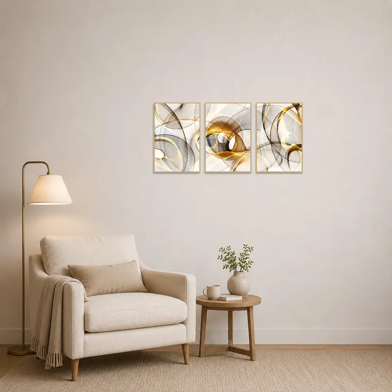 Abstract triptych displayed above a cozy reading chair.