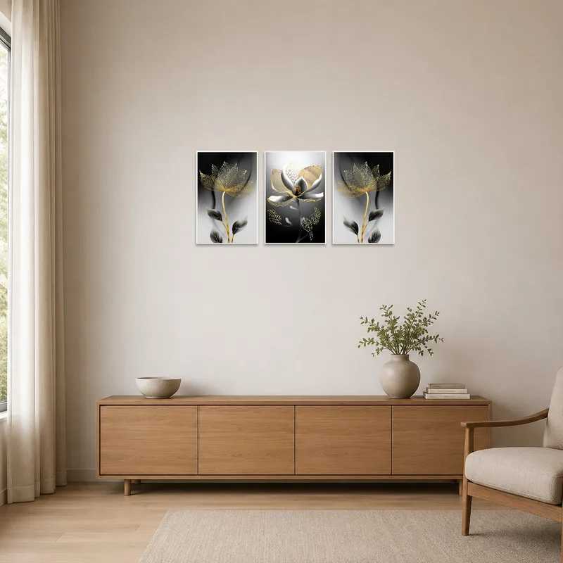Sleek black and gold floral artwork set in a minimalist room with clean lines.
