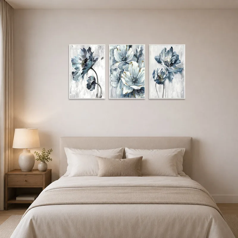 Elegant Blue Floral Vertical Triptych Print Set creating a calming vibe above a neatly made bed.