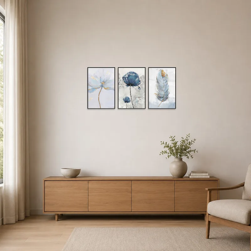 Abstract botanical triptych set enhances a minimalist white wall.
