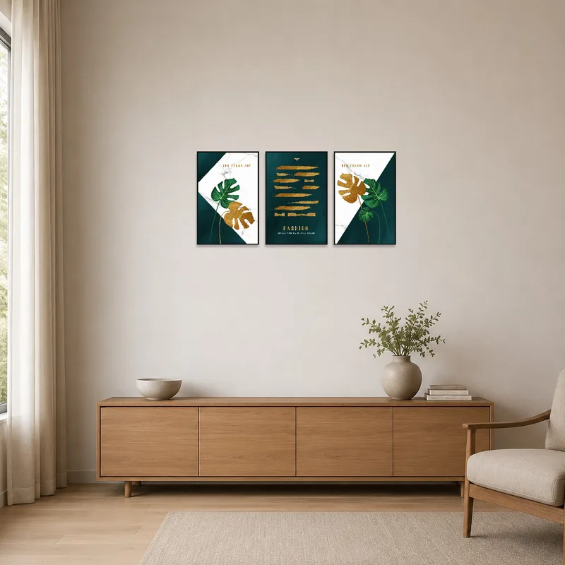 The triptych set enhances the minimalist room with elegant botanical and abstract art.