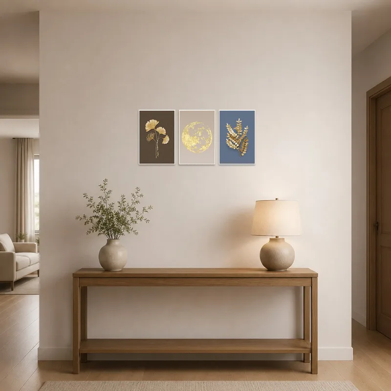 Entrance hall adorned with an elegant gold-themed botanical and lunar artwork.