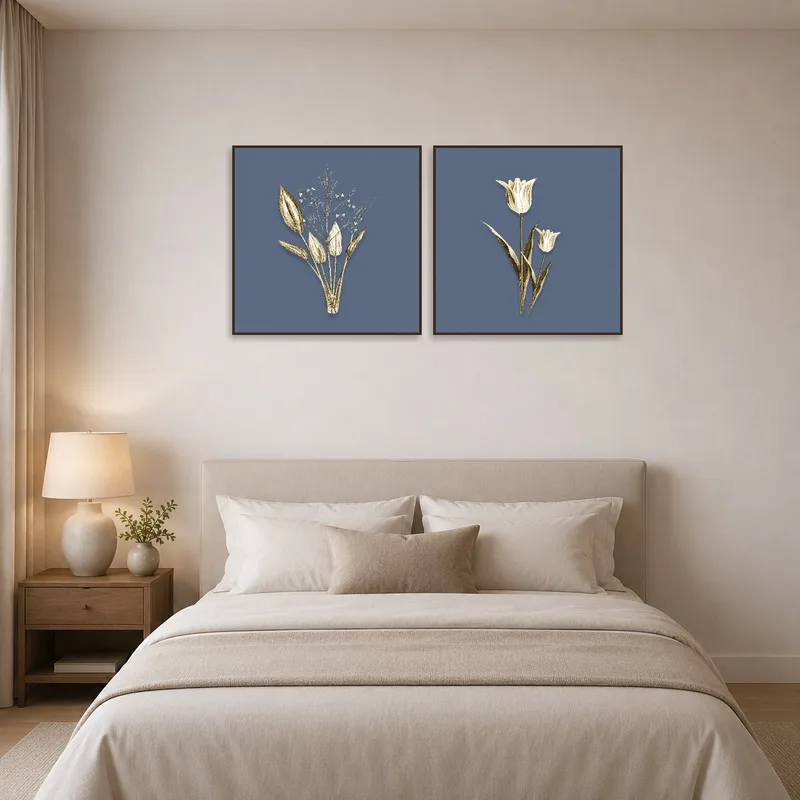 Bedroom walls adorned with an elegant botanical gold on blue art set.
