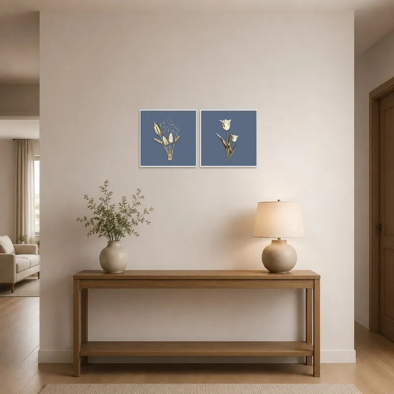 Elegant botanical art in gold on blue greets visitors in the entrance hall.