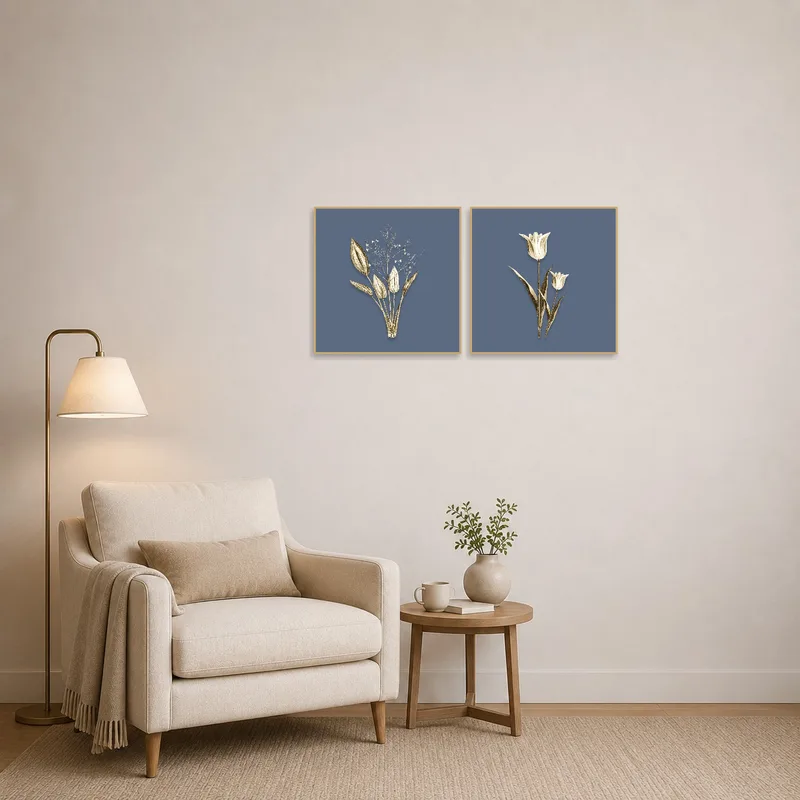 A reading corner enhanced by an art set of botanical gold on blue.