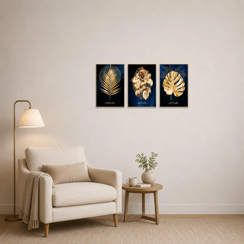 Reading corner with cozy chair and golden leaf triptych on the wall.
