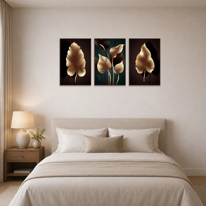 Elegant leaf art triptych as a serene focal point in a peaceful bedroom.