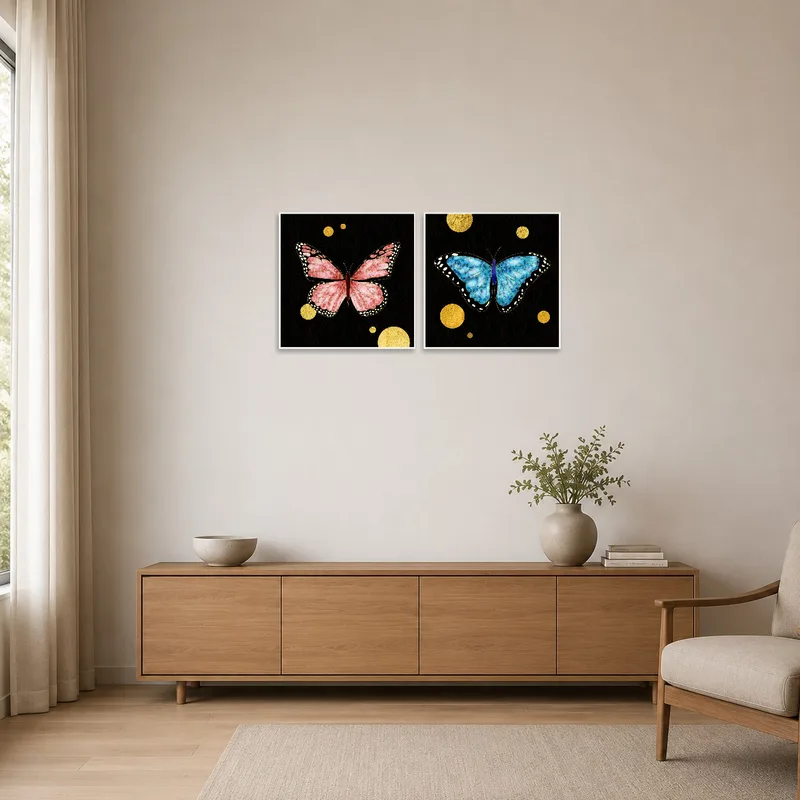 Butterfly artwork with gold details complements a minimalist setting's clean lines.
