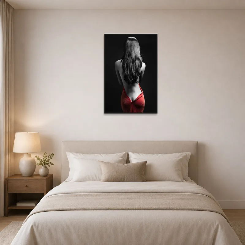 A bedroom showcasing a harmonious red and monochrome wall art.