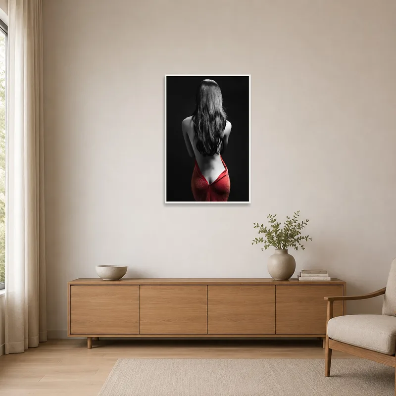 A minimalist space highlighted by a striking red and monochrome piece.