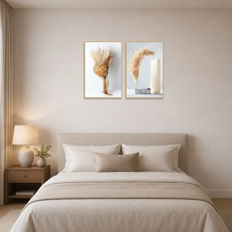 Botanical arrangement set providing calming vibes above the headboard in a tranquil bedroom.
