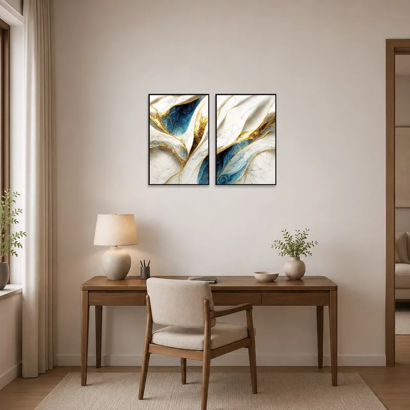 Home office wall featuring abstract prints for an inspirational space.