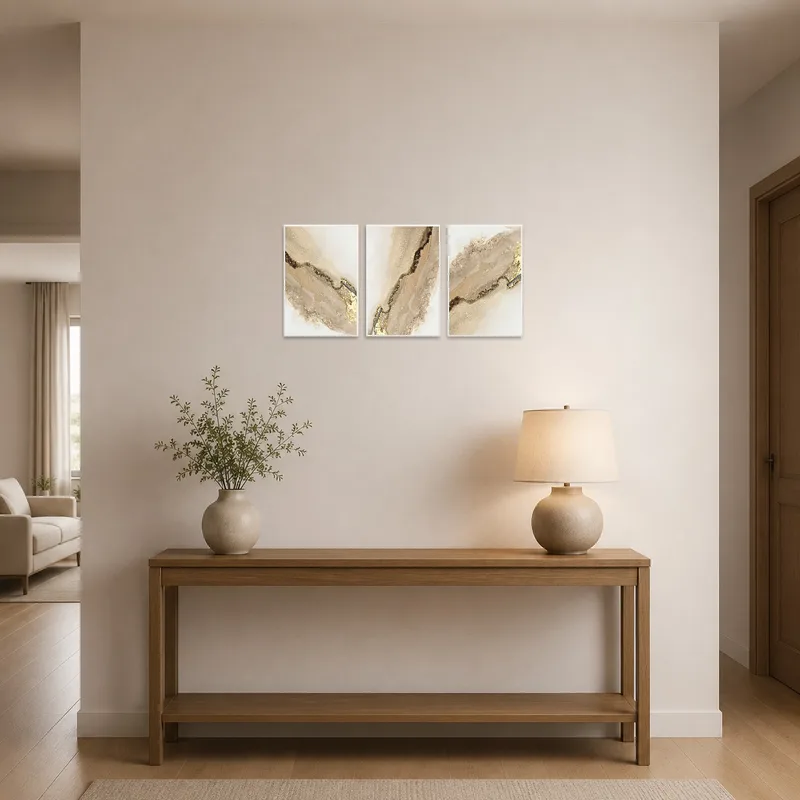Earthy abstract artwork welcomes guests in an entrance hall.
