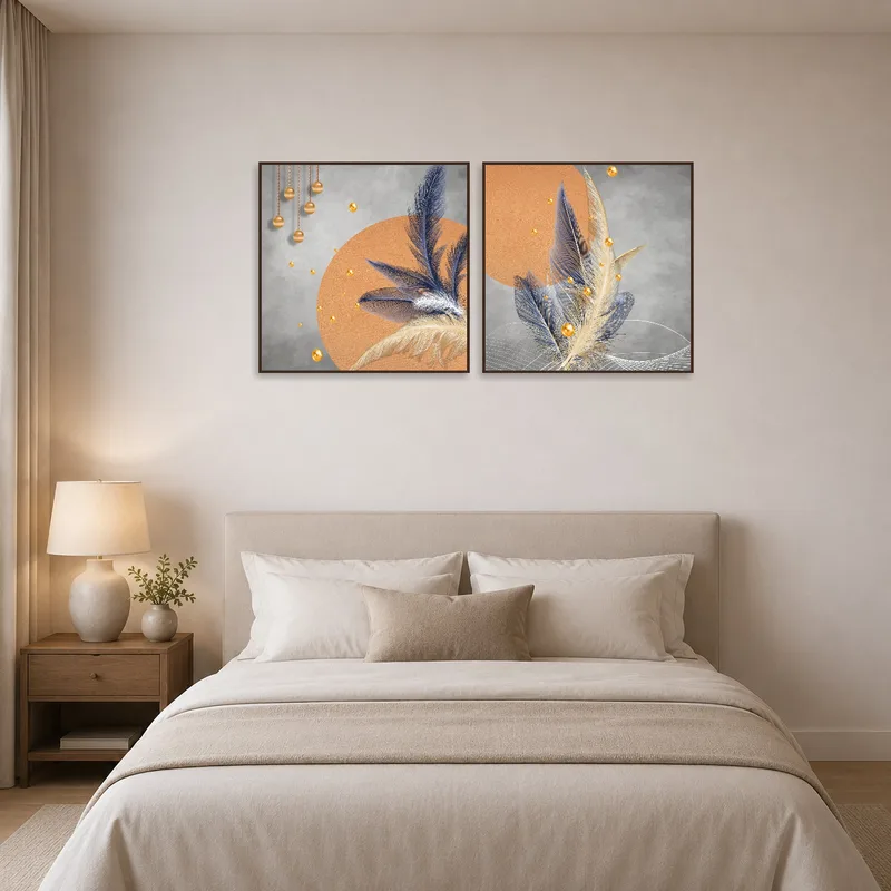 The bedroom exudes tranquility with the elegant gold and feather artworks above the bed.