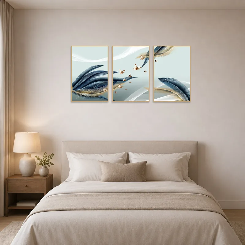 Elegant feather and butterfly pieces enhance bedroom ambiance.